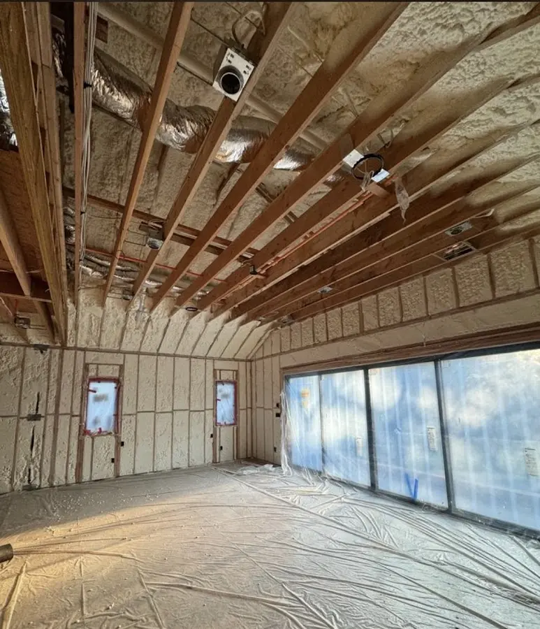 Interior walls and ceiling insulated with spray foam during new construction in River Road